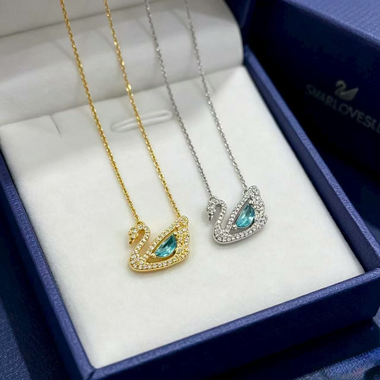 The Cerulean Swan Necklaces